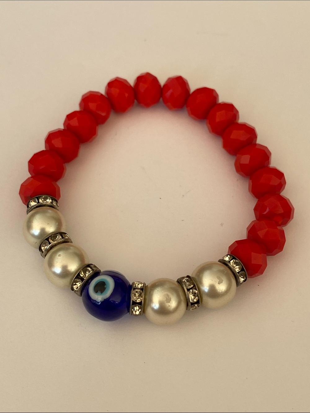 Red Beaded crystal Bracelet with Blue Evil Eye 🧿 and faux Pearl Accents